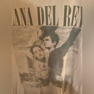 URBAN OUTFITTERS LANA DEL REY NFR TEE COQUETTE
